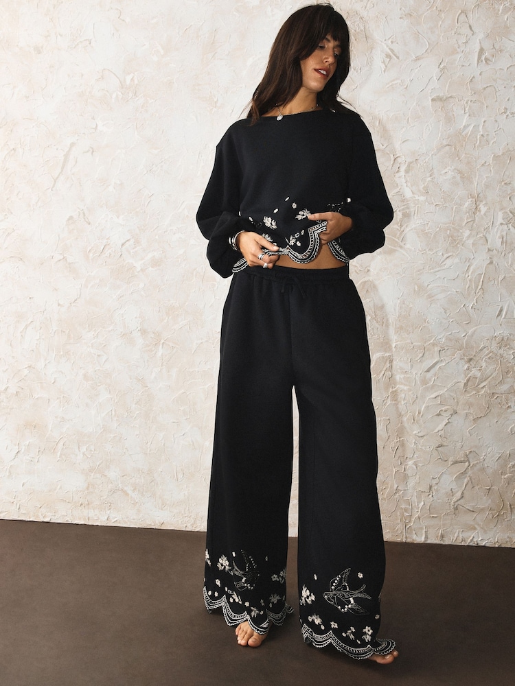 Rockett St George Black Swallow Embroidered Wide Leg Joggers - Image 1 of 6