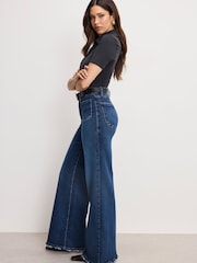 Jeans palazzo Good American Soft Tech a vita alta - Immagine 5 di 6