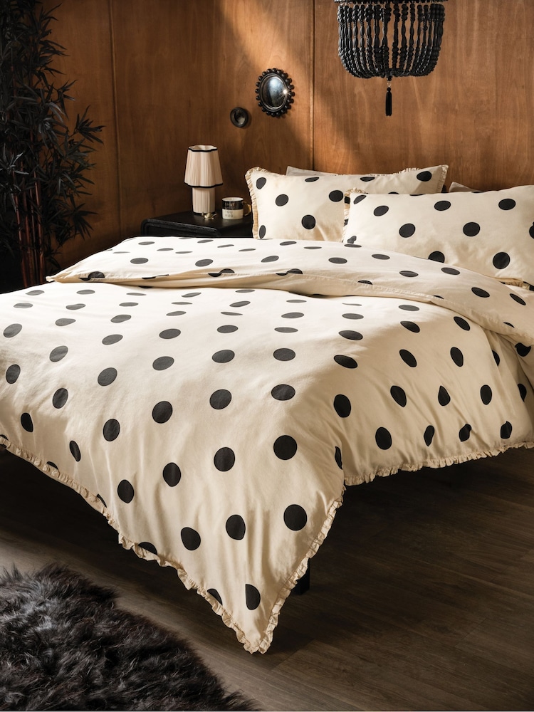 Rockett St George Buttermilk Polka Dot Noir Frill 100% Cotton Duvet Cover and Pillowcase Set - Image 1 of 5 Rockett St George Buttermilk Polka Dot Noir Frill 100% Cotton Duvet Cover and Pillowcase Set - Image 1 of 5