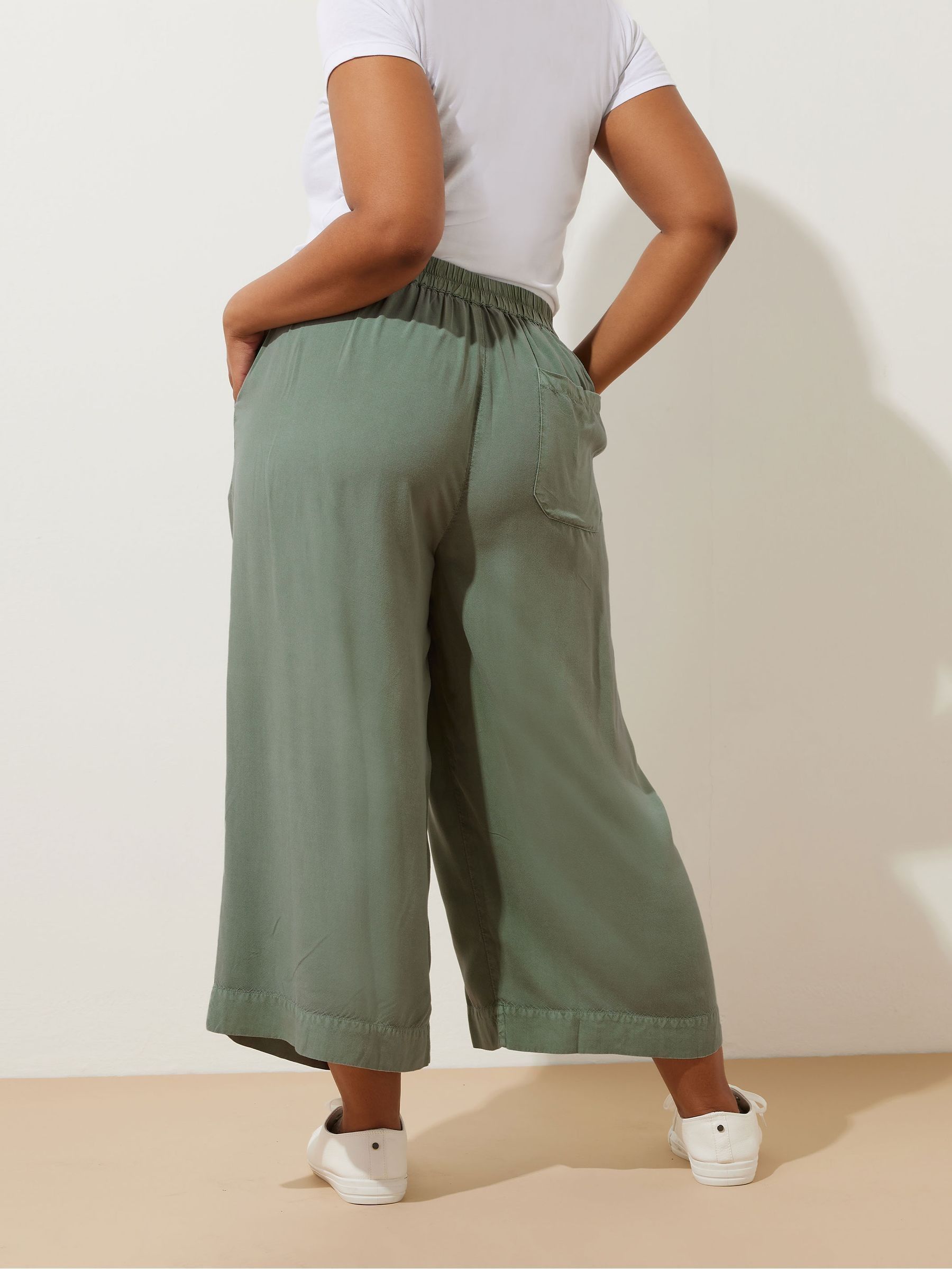 Buy Yours Curve Green Chambray Tie Waist Cropped Trousers from the