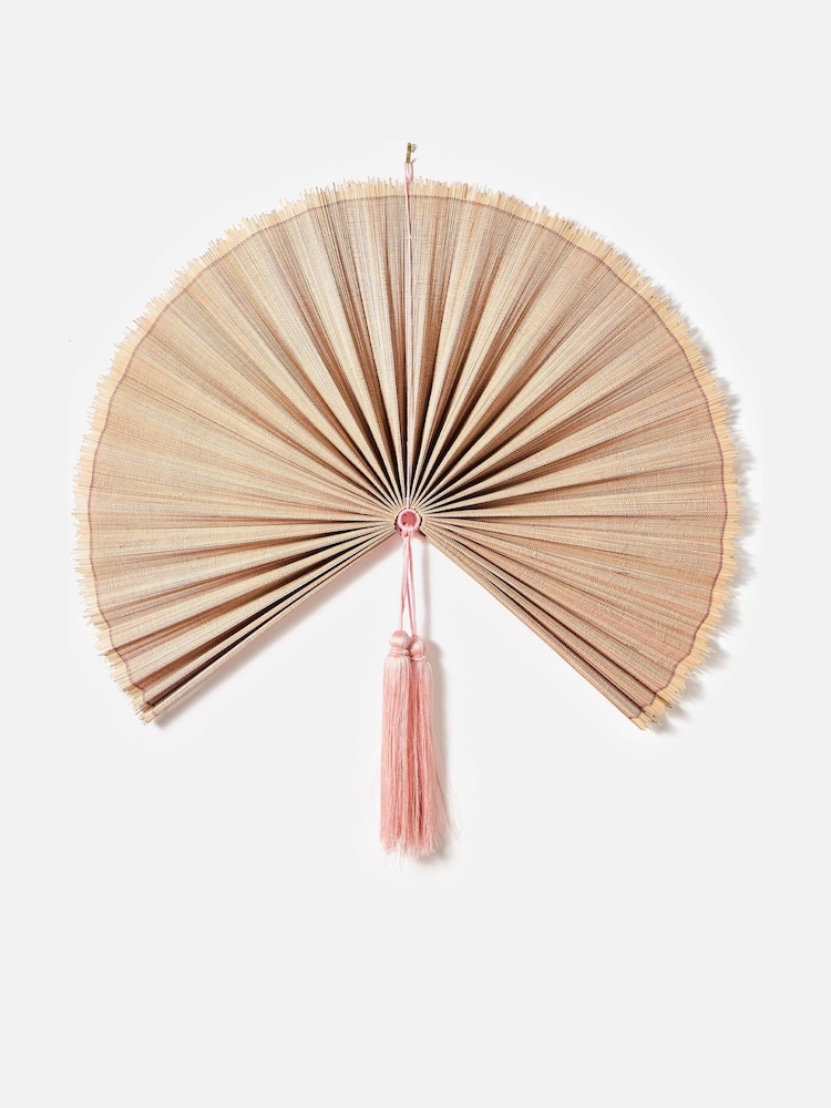 Oliver Bonas Pink Bamboo Fan Tassel Hanging Wall Decor - Image 1 of 4 Oliver Bonas Pink Bamboo Fan Tassel Hanging Wall Decor - Image 1 of 4