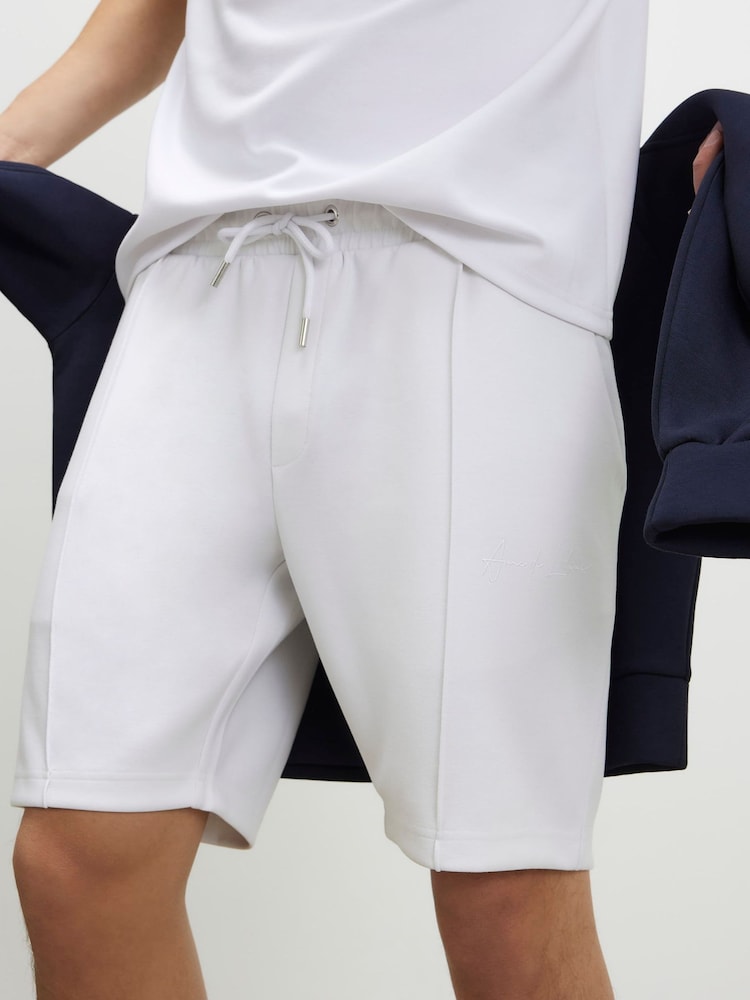 River Island White Slim Fit Interlock Jersey Shorts - Image 1 of 4 River Island White Slim Fit Interlock Jersey Shorts - Image 1 of 4