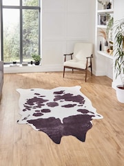 Think Rugs Black Faux Print Cow Animal Print Rug - Image 1 of 6