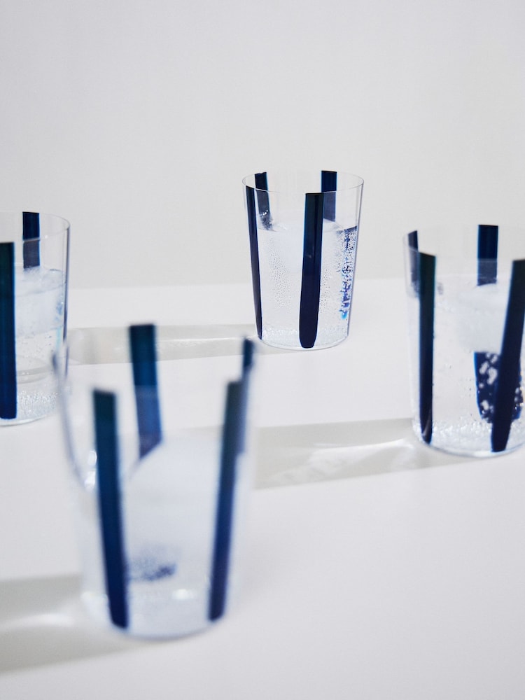 The Conran Shop Set of 4 Navy Nova Stripe 500ml Tumblers - Image 1 of 5 The Conran Shop Set of 4 Navy Nova Stripe 500ml Tumblers - Image 1 of 5