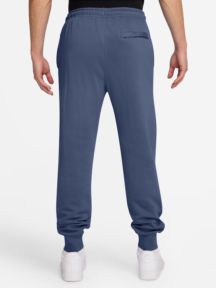 Azul difuminado - Pantalones de chándal de polar con bajo ajustado Club de Nike - Imagen 2 de 3