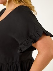 Roman Curve Kjole med V-hals og Frynser - Bilde 6 av 6