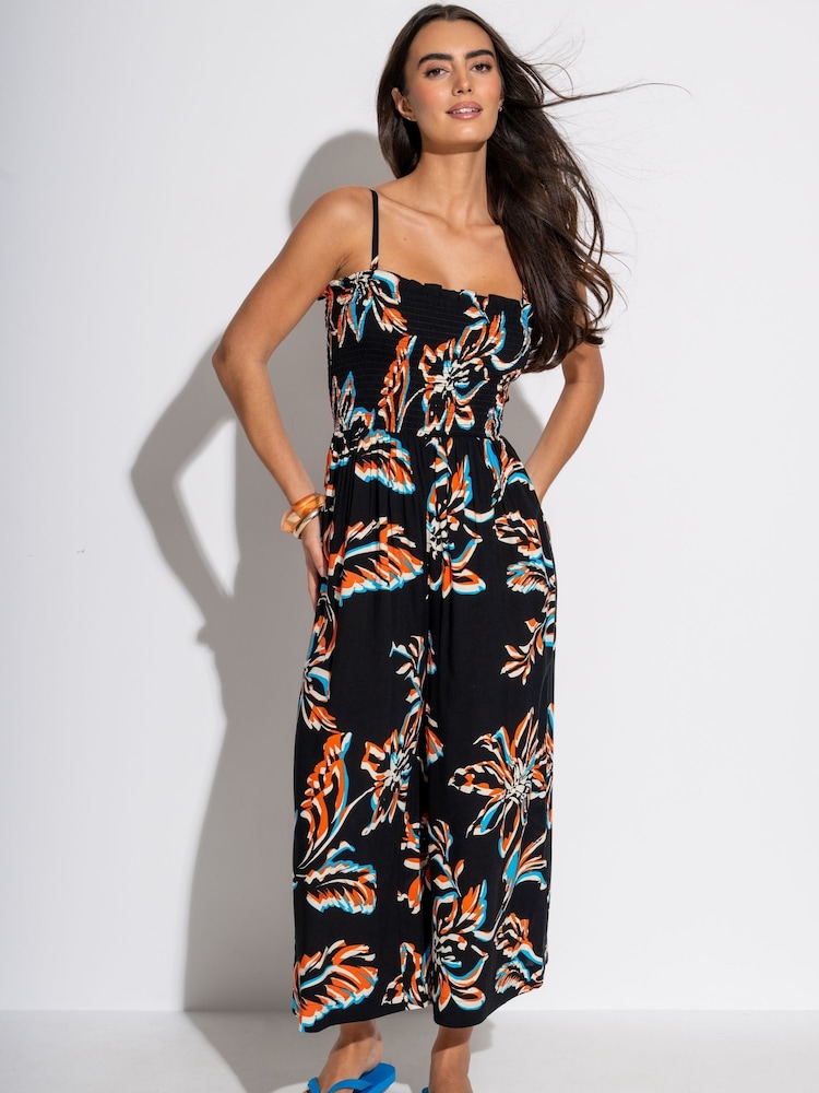 Itim na Bulaklak - Pour Moi Anna Strapless Shirred Bodice Crop Leg Beach Jumpsuit - Larawan 1 ng 4 Itim na Bulaklak - Pour Moi Anna Strapless Shirred Bodice Crop Leg Beach Jumpsuit - Larawan 1 ng 4