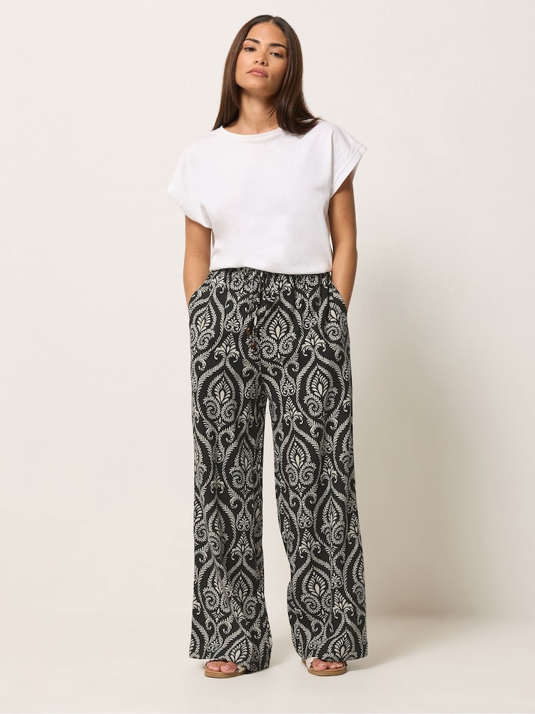 PixieGirl Petite Black Tile Print Wide Leg Trousers - Image 1 of 5