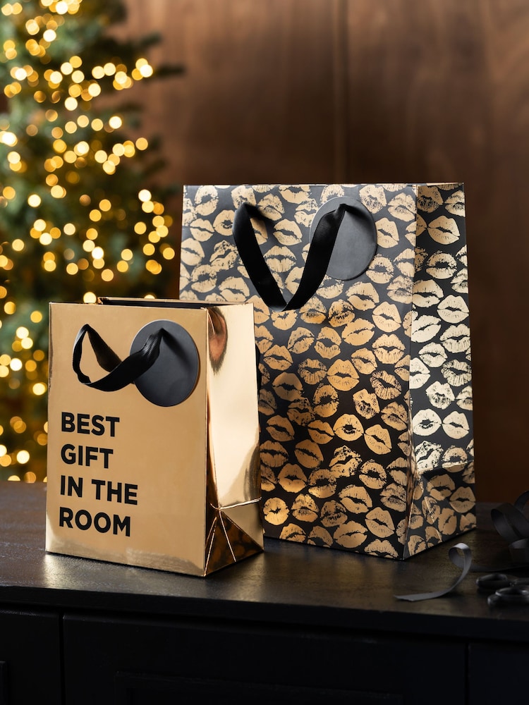 Rockett St George Set of 2 Gold Slogan Gift Bags - Image 1 of 5 Rockett St George Set of 2 Gold Slogan Gift Bags - Image 1 of 5