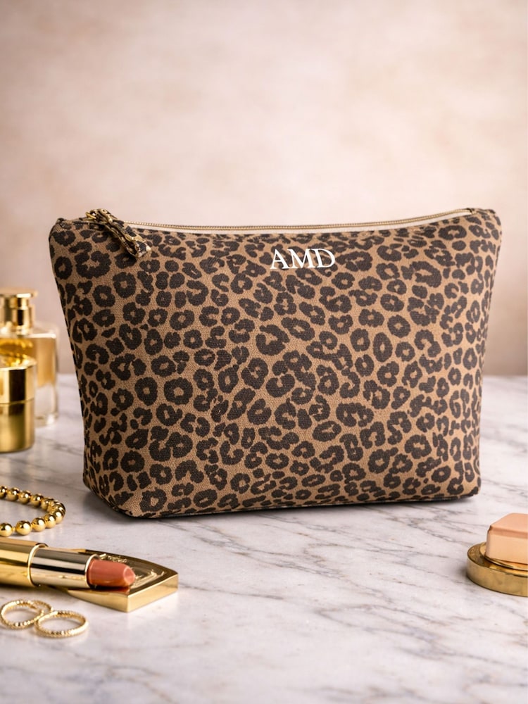 Personalised Leopard Print Makeup Bag by Loveabode - Image 1 of 4