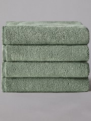 The Set Set of 4 Sage Green Popcorn Textured Bath Towels - Image 1 of 2