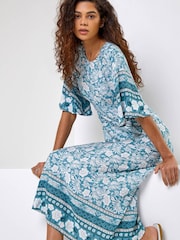 فستان متوسط الطول طبعة زهور من Roman - Image 1 of 5