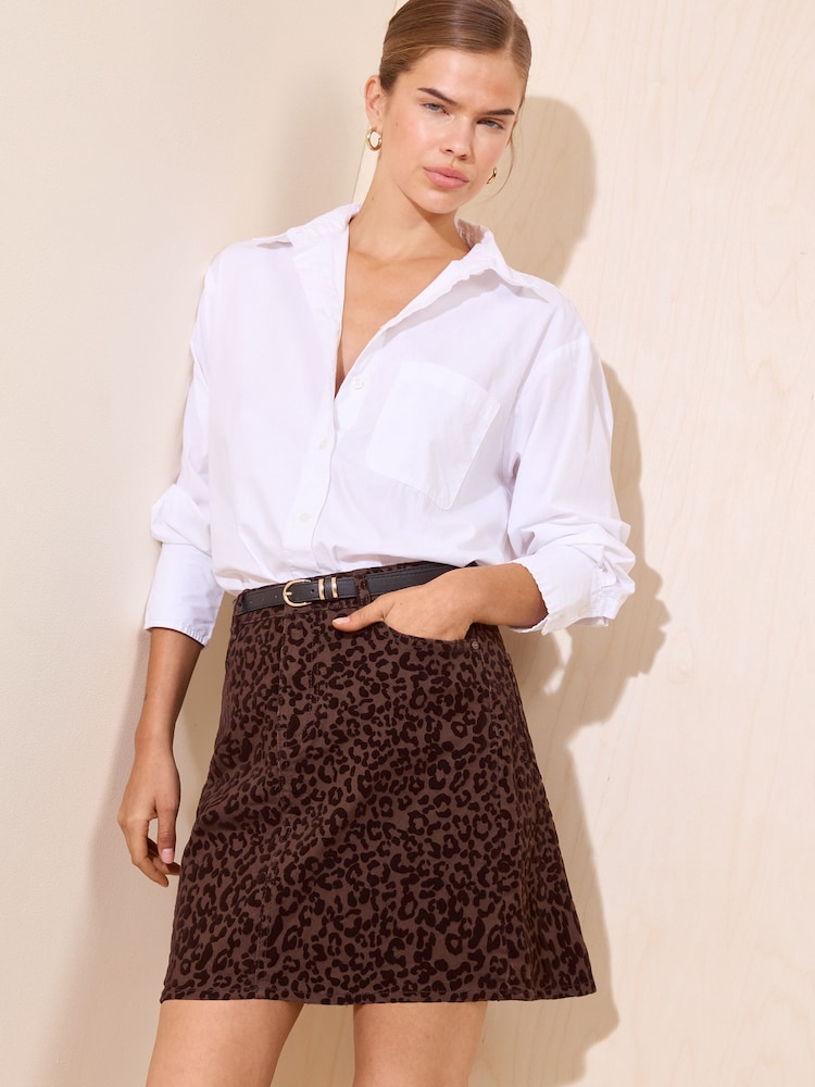 Friends Like These Chocolate Brown Flocked Leopard Print Denim Mini Skirt - Image 1 of 5