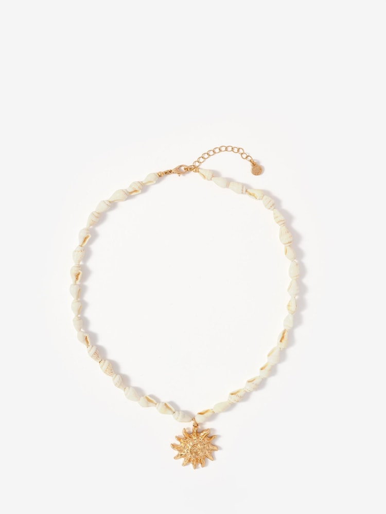 Mint Velvet Gold Tone Shell Statement Sun Charm Necklace - Image 1 of 4 Mint Velvet Gold Tone Shell Statement Sun Charm Necklace - Image 1 of 4