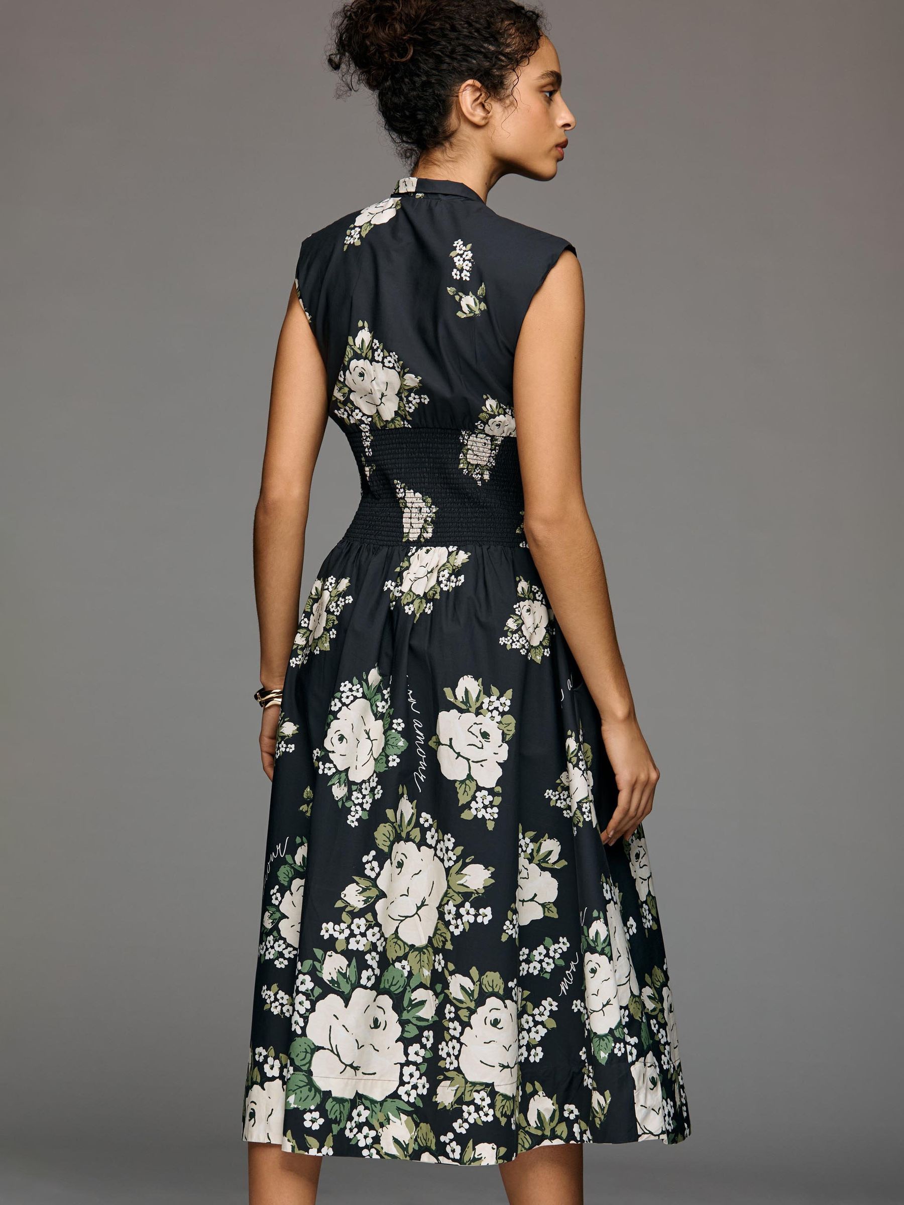 Buy Anthropologie Black The Tommie Cap-Sleeve Smocked Front-Zip