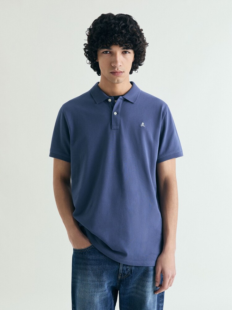 Azul - Scalpers Slight Skull Polo Shirt - Imagen 1 de 5