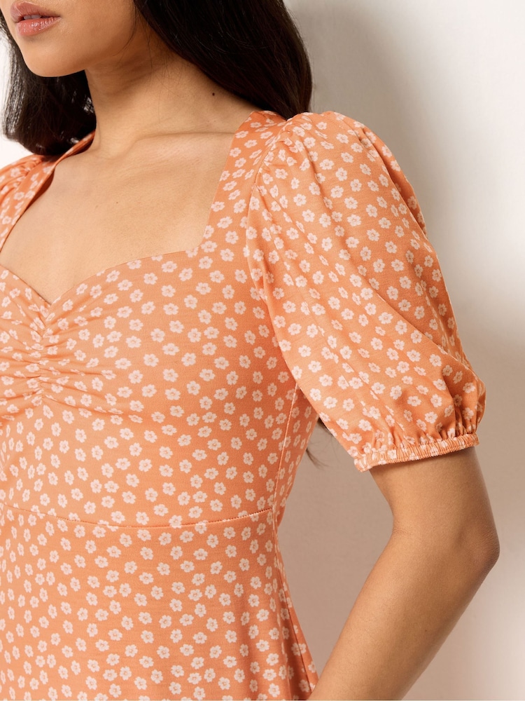 orange daisy dress SSYS The Short Sleeve Emery Midi Dress In Pink Orange Daisy