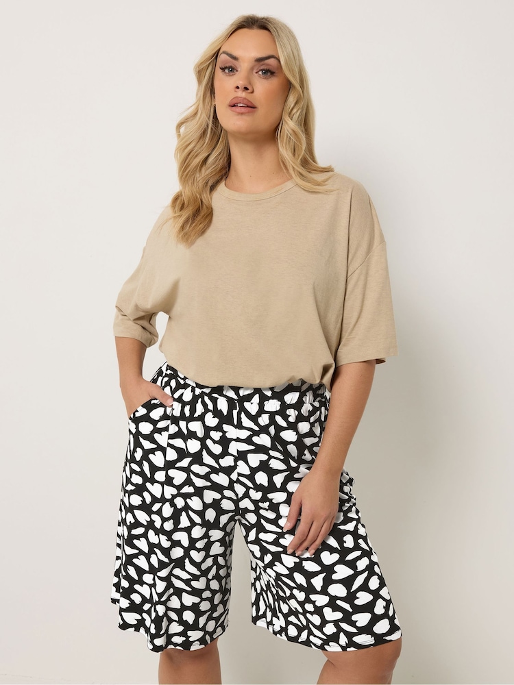 Yours Curve Black Heart Print Jersey Shorts - Image 1 of 5 Yours Curve Black Heart Print Jersey Shorts - Image 1 of 5