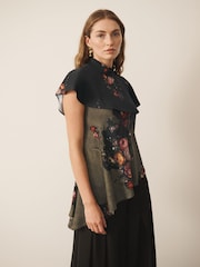 CERENE Iris Green Majestic Floral Print Satin Asymmetric Short Sleeve Cape Top - Image 3 of 9