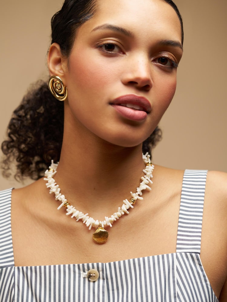 Orelia London Gold Tone Statement Cream Coral Chip & Shell Necklace - Image 1 of 4
