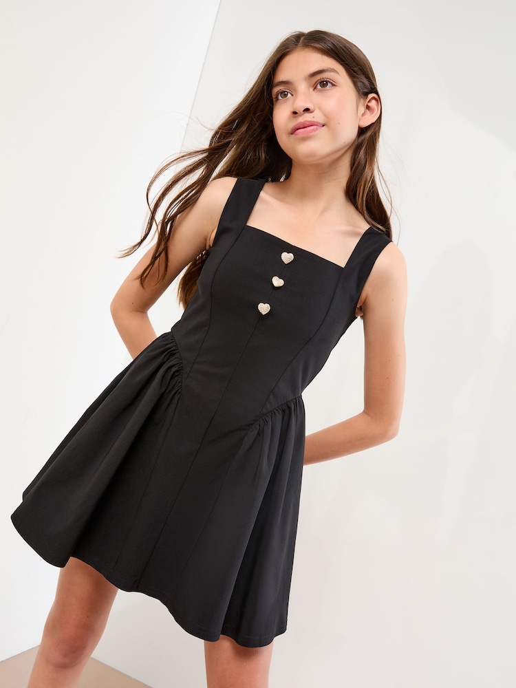 Lipsy Black Diamante Heart Button Skater Dress (7-15yrs) - Image 1 of 5
