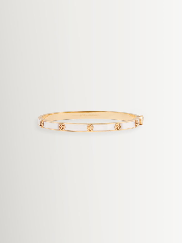 Tory Burch Gold Tone Thin Icon Mother of Pearl Hinge Bracelet - Image 1 of 2 Tory Burch Gold Tone Thin Icon Mother of Pearl Hinge Bracelet - Image 1 of 2