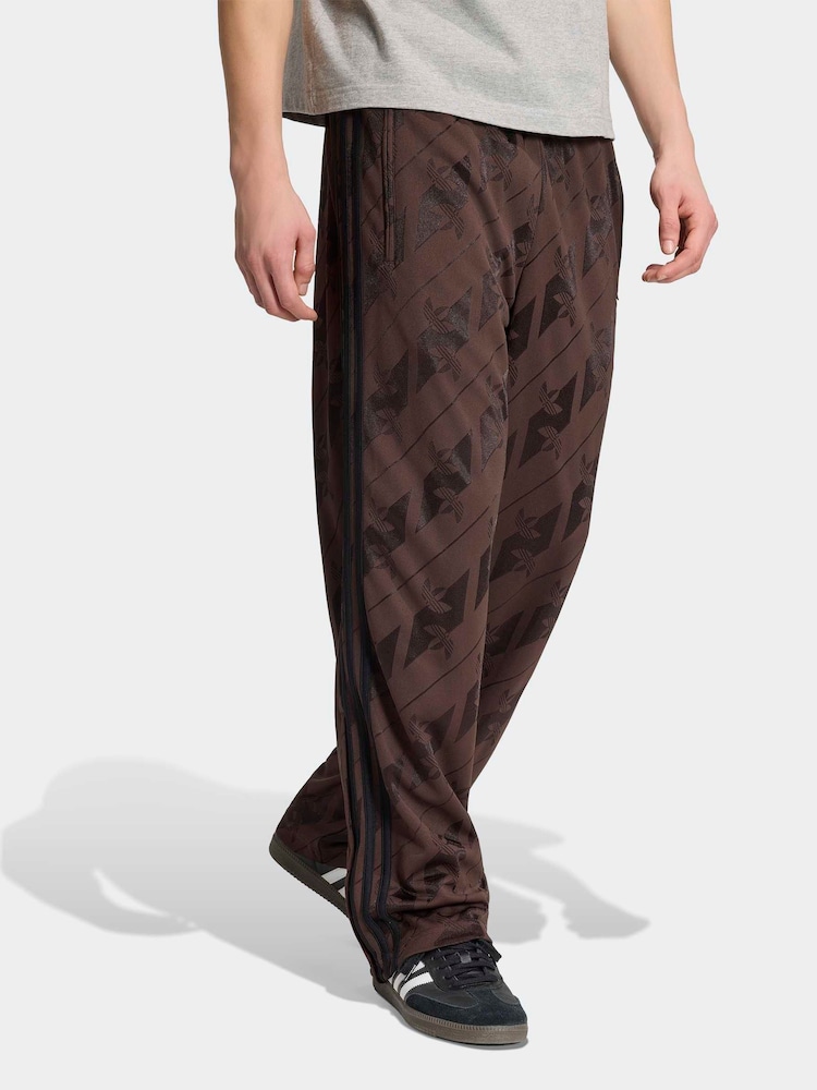 adidas Originals Brown Monogram Firebird Track Pants - Image 1 of 6 adidas Originals Brown Monogram Firebird Track Pants - Image 1 of 6