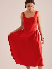 أحمر - فستان متوسط الطول من القطن والكتان بقصّة ساعة رملية من Anthropologie - Image 1 of 4