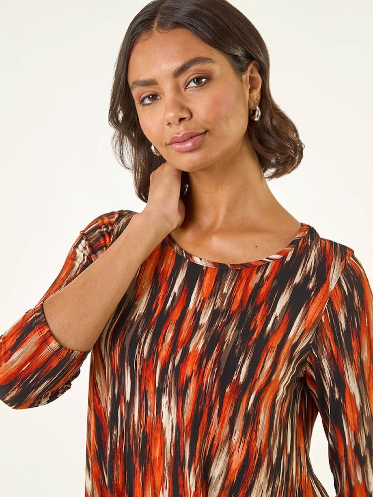 Roman Orange Abstract Print Hanky Hem Stretch Tunic Top - Image 1 of 5 Roman Orange Abstract Print Hanky Hem Stretch Tunic Top - Image 1 of 5