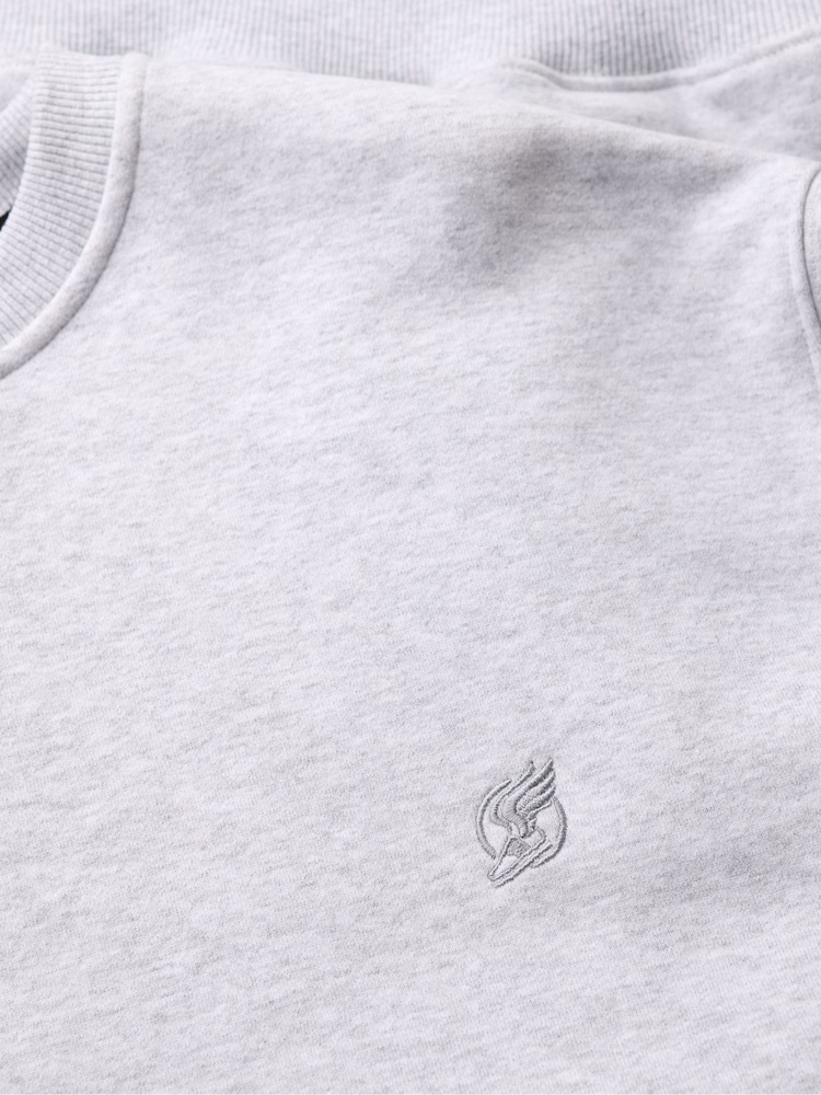 رداء علوي رياضي فضفاض سادة برقبة مستديرة من Superdry - صورة 9 من 9 رداء علوي رياضي فضفاض سادة برقبة مستديرة من Superdry - صورة 9 من 9