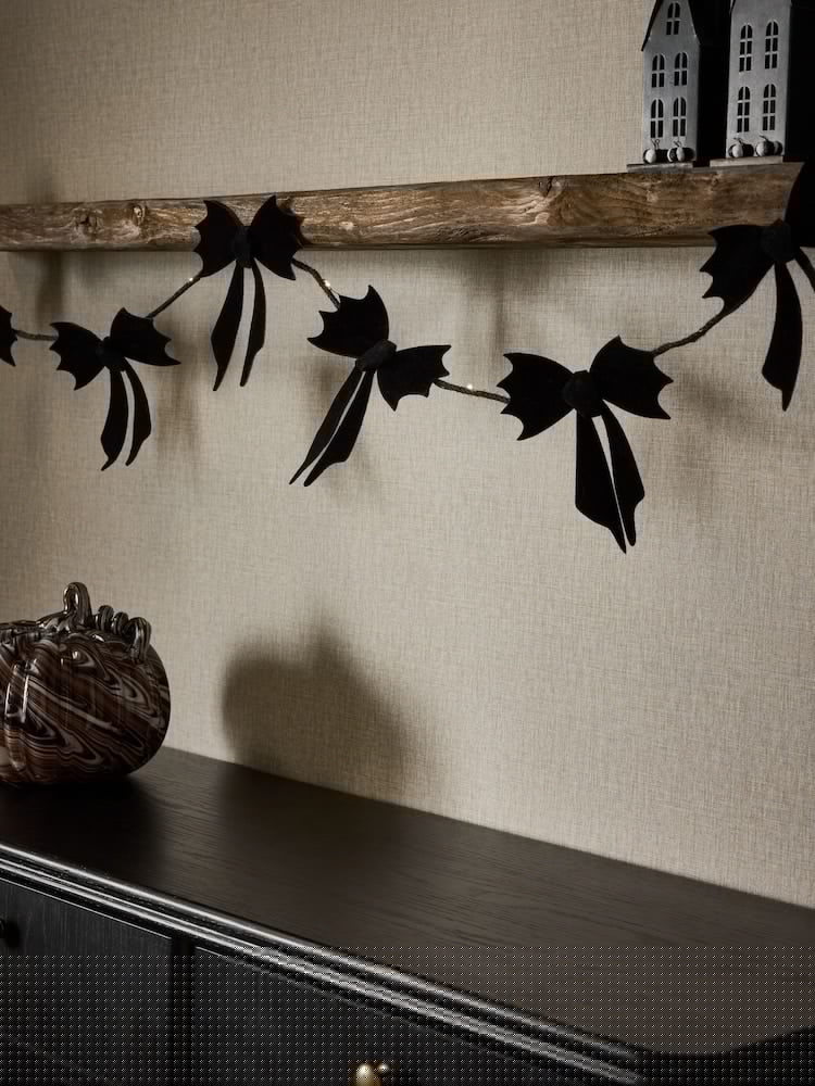 Black Light Up Bat Bow Halloween Garland - Image 1 of 4 Black Light Up Bat Bow Halloween Garland - Image 1 of 4