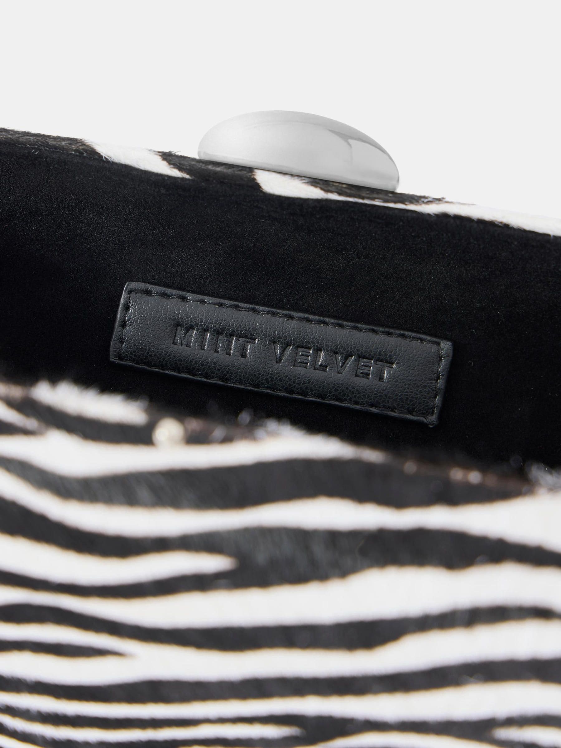 Buy Mint Velvet Cream Zebra Print Clutch Bag from Next Netherlands