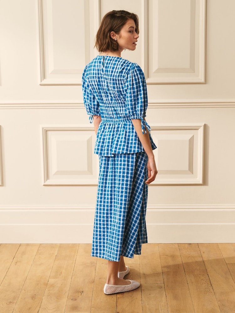 Laura Ashley Blue/White Cotton Short Sleeve Gingham Shirred Waist Midi Dress with Peplum Waist - Image 2 of 11