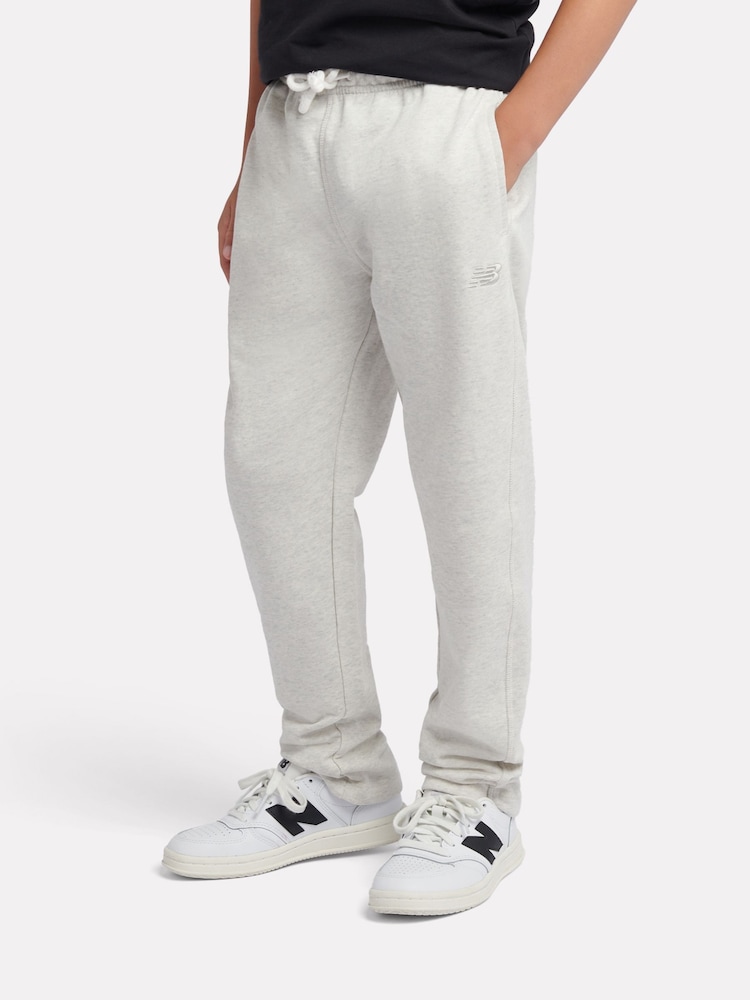New Balance Grey French Terry Small Logo Straight Leg Joggers - Image 1 of 8 New Balance Grey French Terry Small Logo Straight Leg Joggers - Image 1 of 8