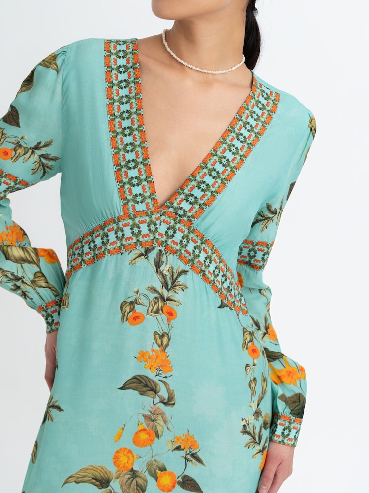 Raishma Blue Elsa Is A Sophisticated Midi Dress Featuring A Deep V-Neckline Long Statement Sleeves And A Flowing Silhouette - Image 3 of 3 Raishma Blue Elsa Is A Sophisticated Midi Dress Featuring A Deep V-Neckline Long Statement Sleeves And A Flowing Silhouette - Image 3 of 3