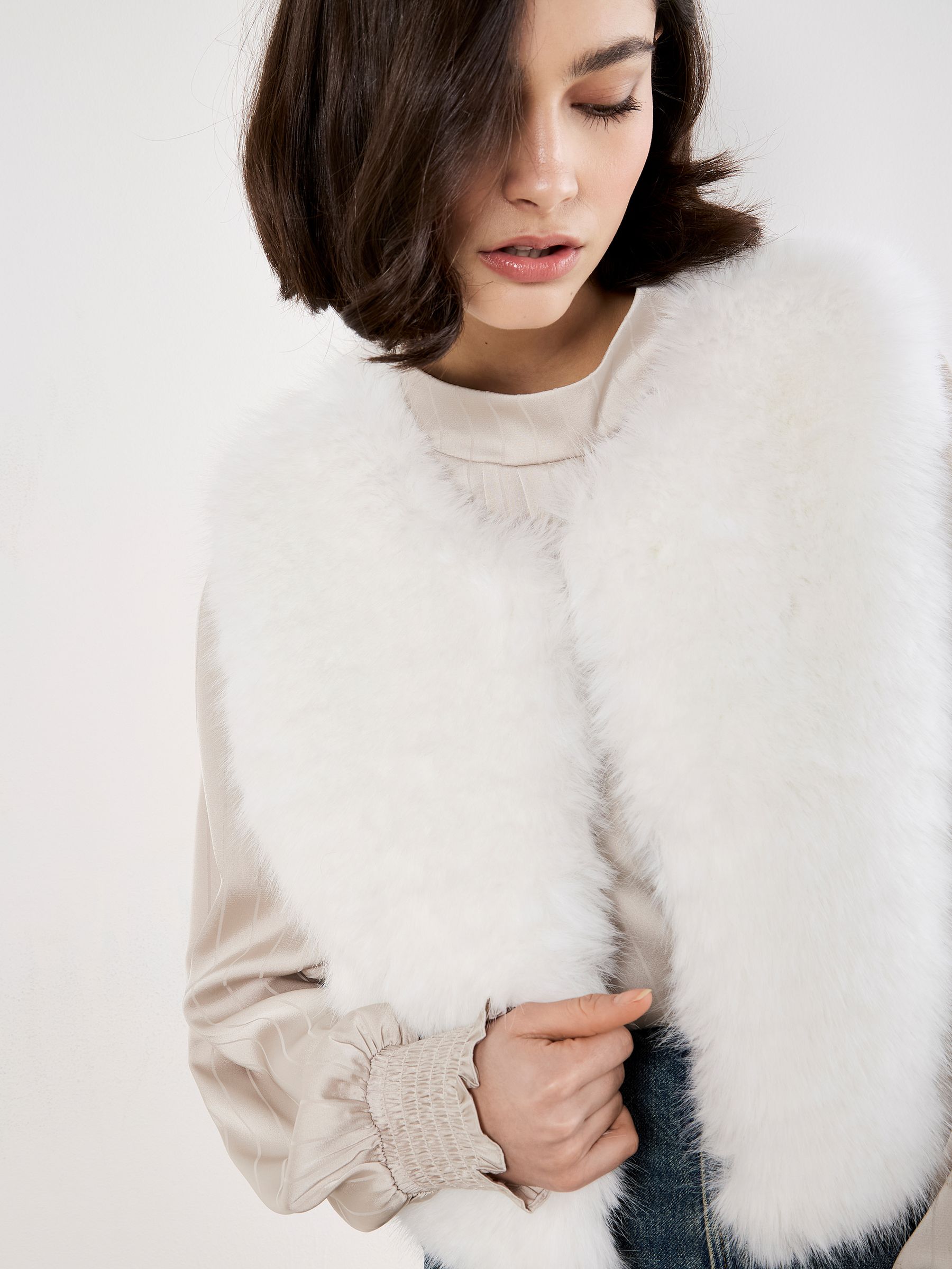 Buy Apricot White Fur Cropped Gilet from the Next UK online shop