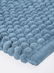 Alfombra corredera con pompones gigantes - Imagen 3 de 3