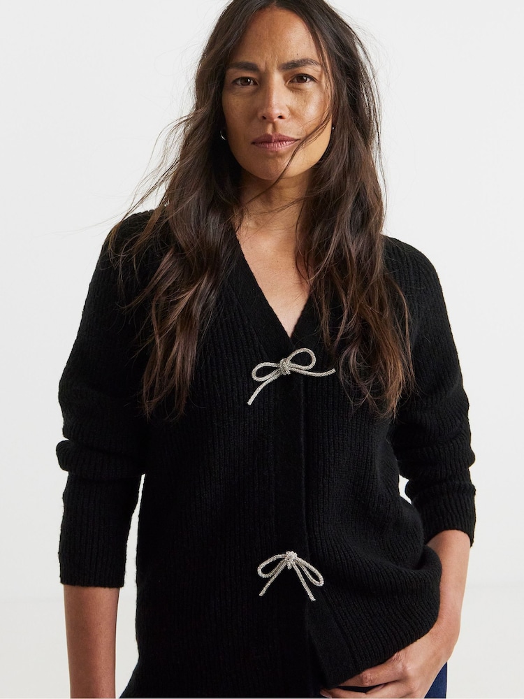 JD Williams Black Bow Button Long Sleeve Cardigan - Image 1 of 4 JD Williams Black Bow Button Long Sleeve Cardigan - Image 1 of 4