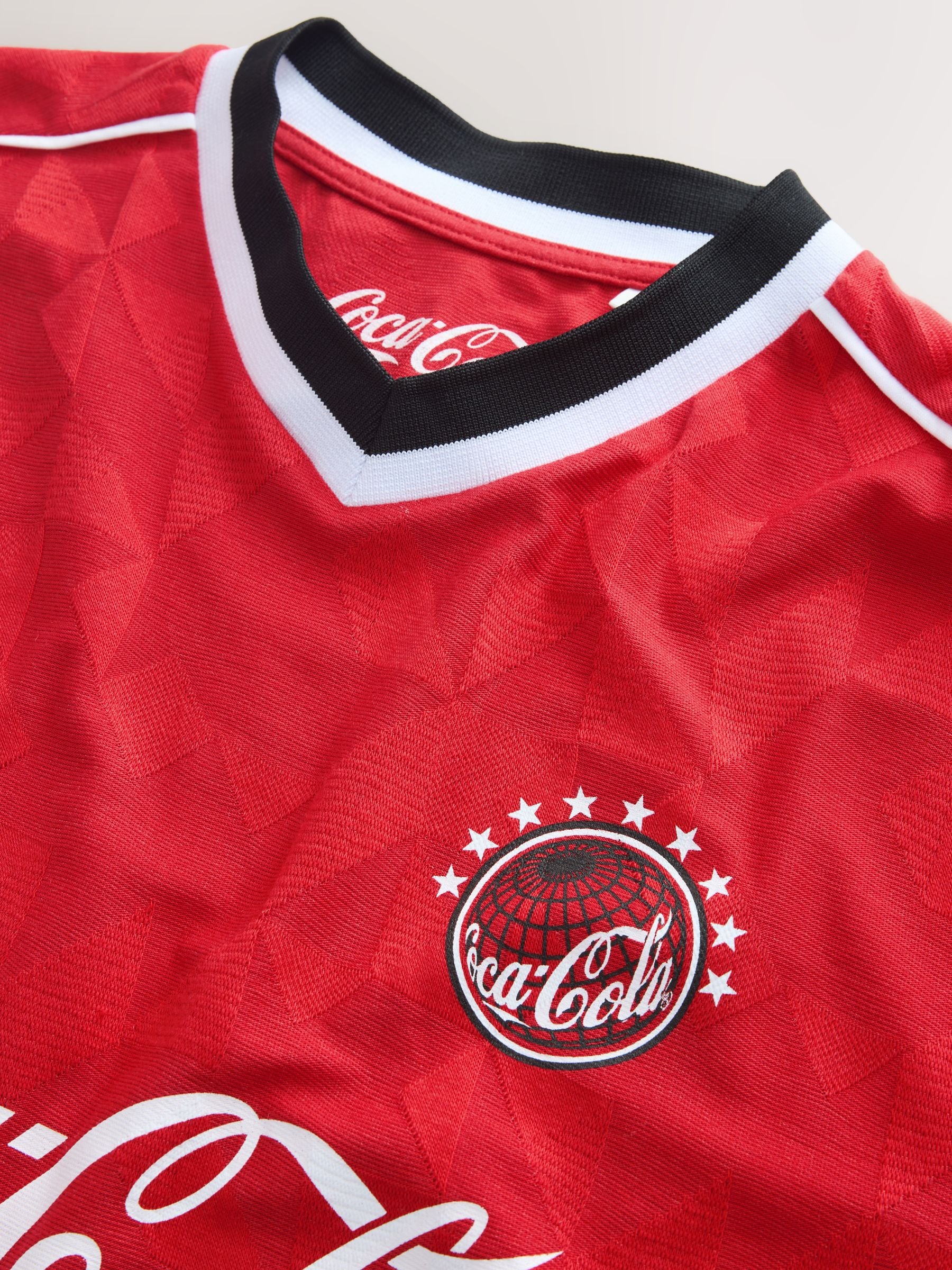 Buy Red Coca Cola License Football T-Shirt from Next Singapore