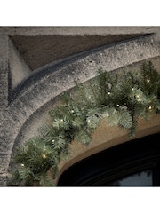 Lights4fun 1.5m Pre Lit LED Outdoor Fir Garland - Image 1 of 3