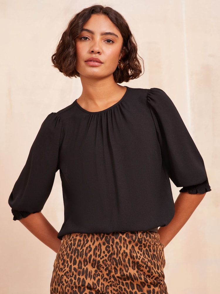 Friends Like These Black 3/4 Sleeve Shirred Cuff Blouse - Image 1 of 4 Friends Like These Black 3/4 Sleeve Shirred Cuff Blouse - Image 1 of 4