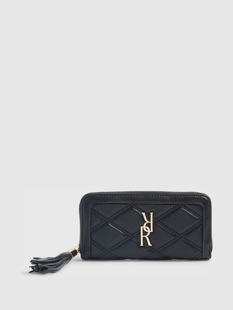River Island Black Logo Quilted Zip Around Purse With Tassel - Image 1 of 5 River Island Black Logo Quilted Zip Around Purse With Tassel - Image 1 of 5