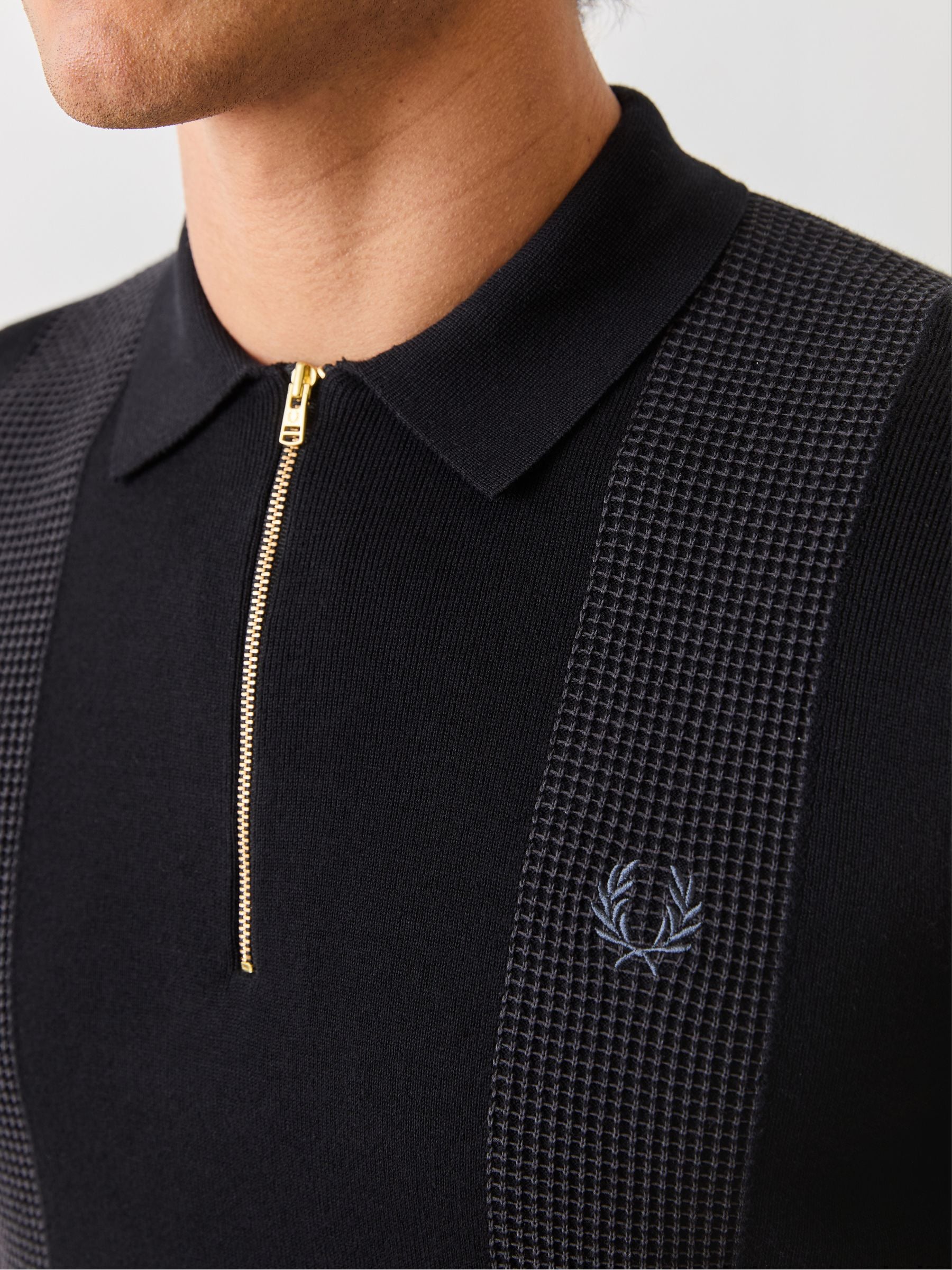 Buy Fred Perry Black Panel Detail Knitted Polo Shirt from the Next
