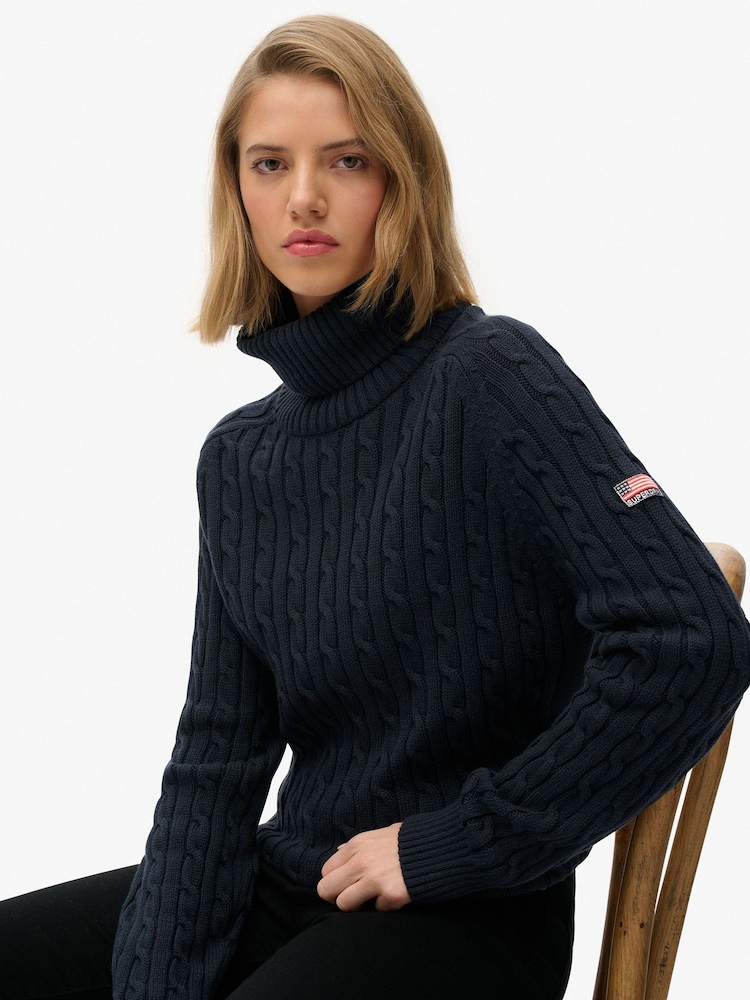 Superdry Blue Slouchy Cable Roll Neck Jumper - Image 1 of 6 Superdry Blue Slouchy Cable Roll Neck Jumper - Image 1 of 6