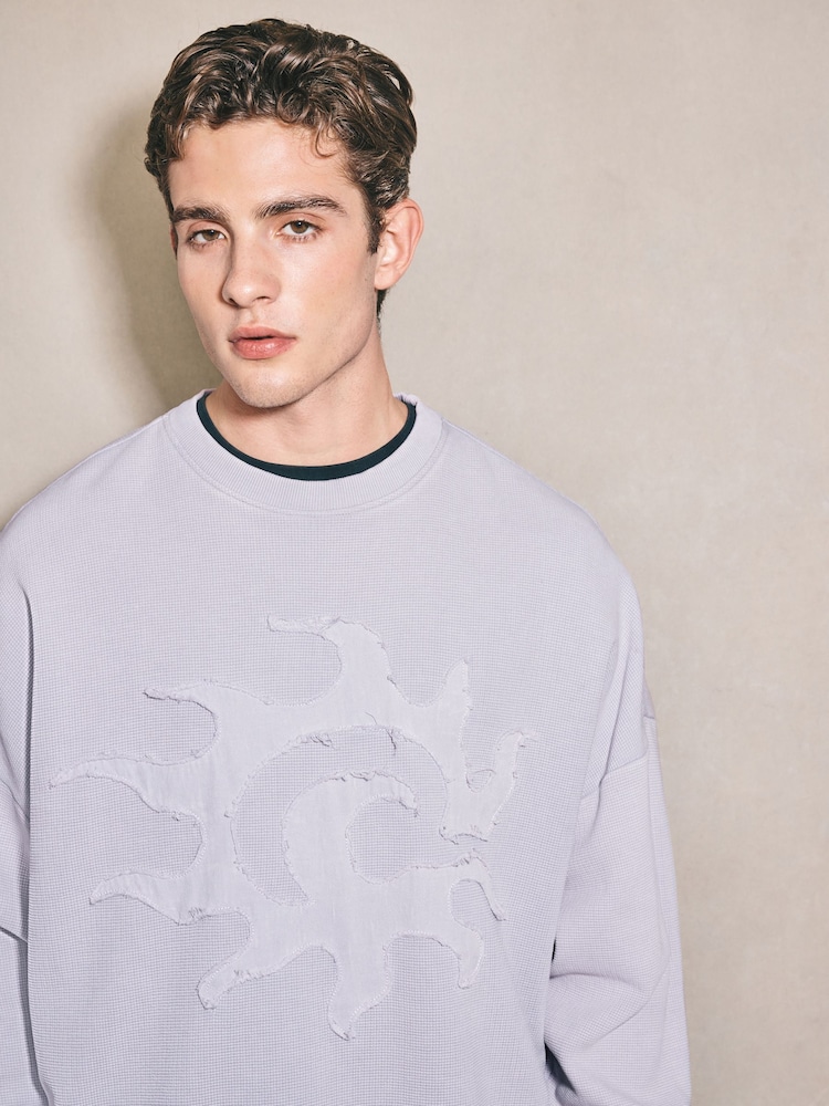 Light Purple EDIT Graphic Waffle Texture Crew Neck Sweatshirt - Image 1 of 8 Light Purple EDIT Graphic Waffle Texture Crew Neck Sweatshirt - Image 1 of 8