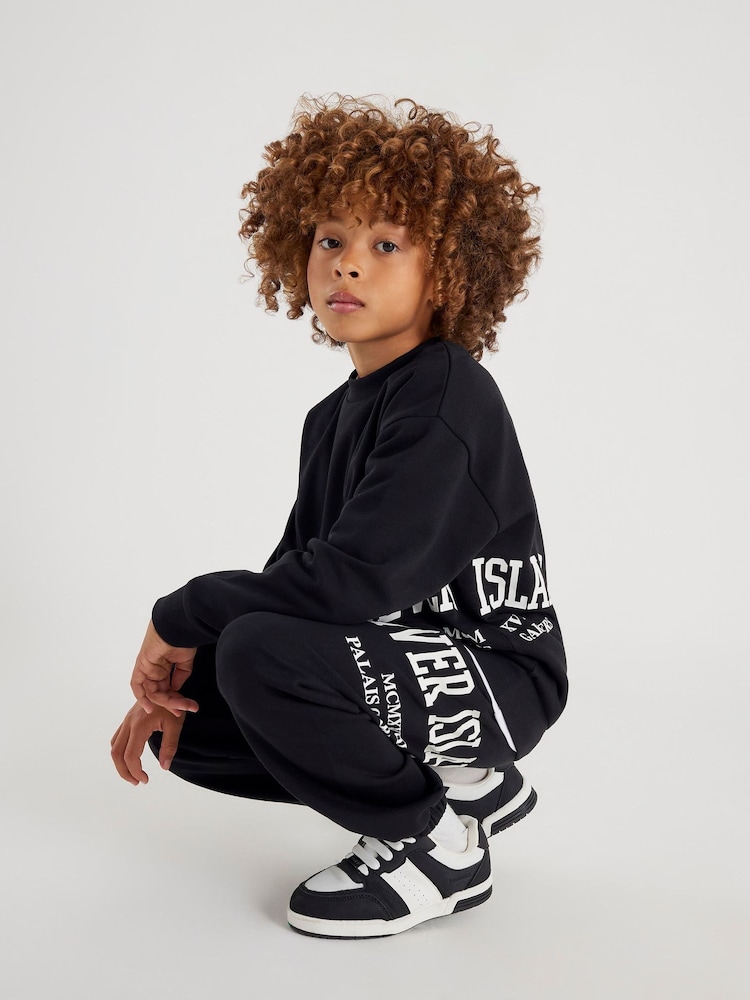 River Island Black River Varsity Sweatshirt & Jogger Set - Image 2 of 6 River Island Black River Varsity Sweatshirt & Jogger Set - Image 2 of 6