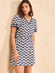 Love & Roses Navy Geo Wave Print Petite V-Neck Scallop Jersey Mini Dress - Image 1 of 4