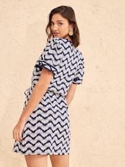 Love & Roses Navy Geo Wave Print Petite V-Neck Scallop Jersey Mini Dress - Image 4 of 4
