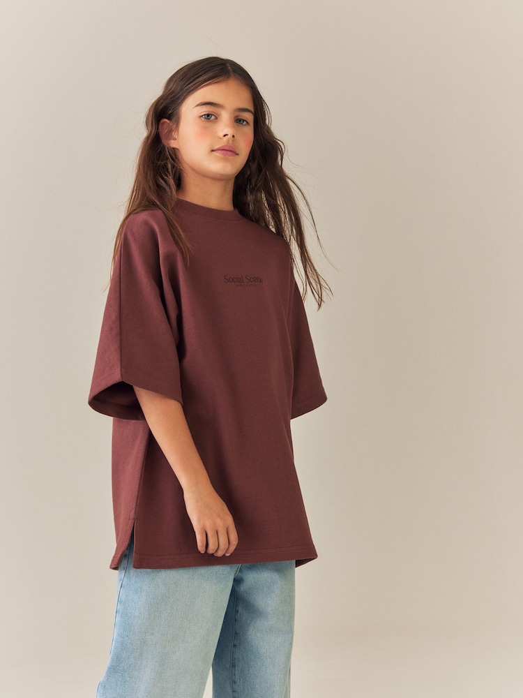 Braun - Oversize-T-Shirt mit Grafik (3–16 J.) - Bild 2 von 4 Braun - Oversize-T-Shirt mit Grafik (3–16 J.) - Bild 2 von 4