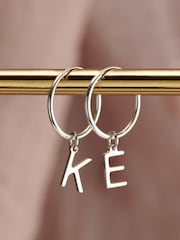 Posh Totty Designs Silver Tone Letter Hoop Earrings - Image 1 of 3